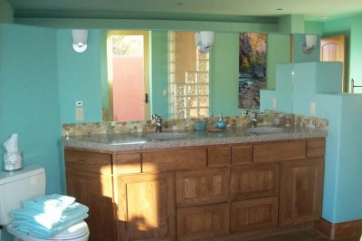 The vanity top is carved from a single piece of 8 thick granite
