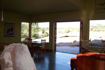 We have a boulder IN the great room, and a tri-fold door that opens wide to the backyard!