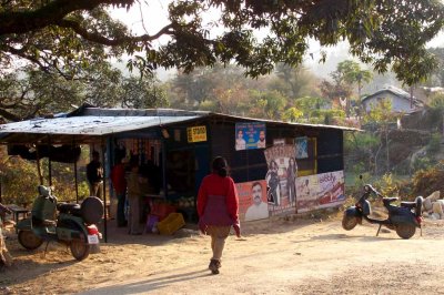 Piky walks towards a shop in the village