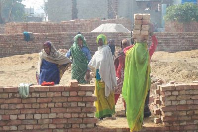 More women helping to bring bricks