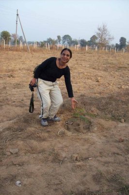 Deepa demonstrates that trees have been planted!