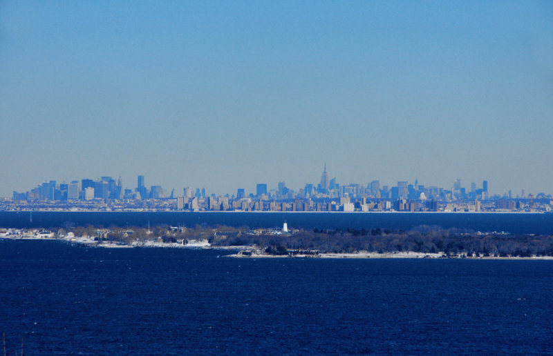 NYC from highlands.with Sandy Hook Lighthouse
