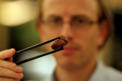 eating silk worm !?