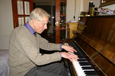 Jim playing Mum's Piano