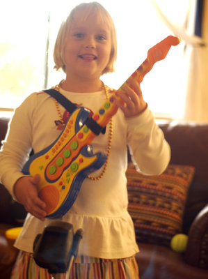 Maeve on guitar