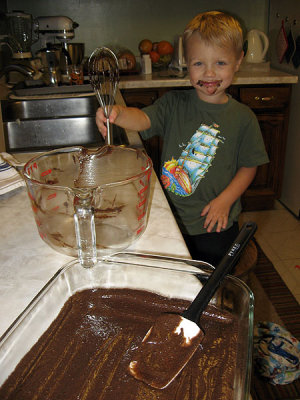 Simon helps make brownies