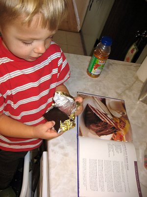 Simon helps make his bday cake