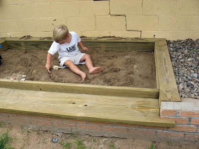 Sandbox is still fun, even when wet