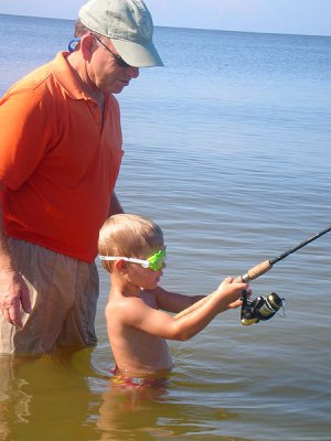 Simon can swim and fish at the same time