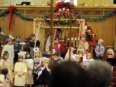 At the manger scene (far right)