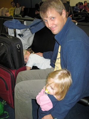 Sleepy travelers in DFW, Christmas night