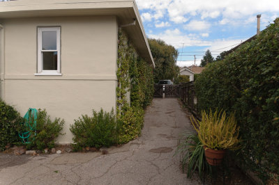 Driveway along South side of house