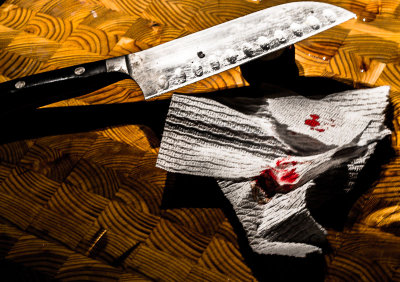 It was done in the KITCHEN with the KNIFE by BRAD ROSS