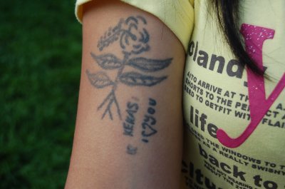 Tattoo on her arm. Justin was impressed.