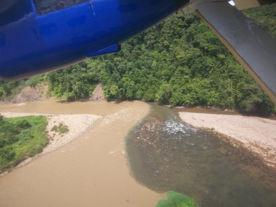 A polluted river and a clear river on the right