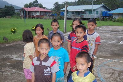 There is only 1 boy from a longhouse. Left row is children from Long Naring