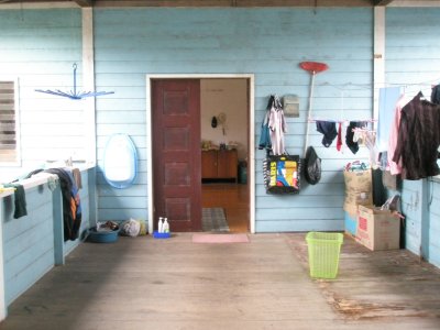 Adjoining hall to the kitchen. Typical in Sarawak longhouse, both side is open.