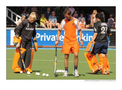 warming up for Dutch keepers Floortje Engels and Inge Vermeulen