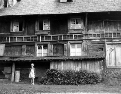 My Wife at 9 years old in front of 17th century farmhouse in Hinterzarten, Germany