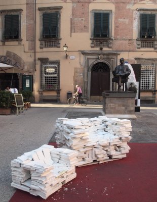 Seated at Puccini's Feet