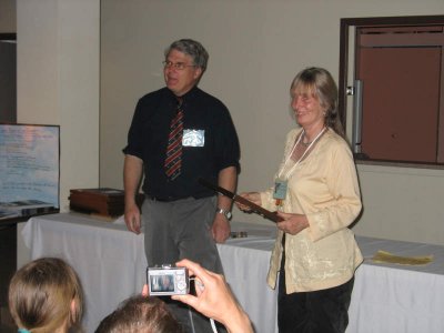 Ken presenting the Honorary Membership to Christine Hanrahan