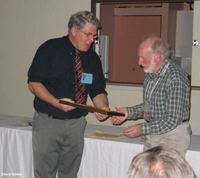 Stan Rosenbaum (R), presented with the Conservation Award