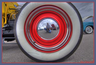 reflection in a hubcap