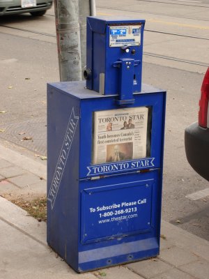 Newspaper vending machine