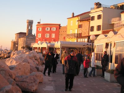  Late afternoon light and the end of our walk in Piran -- Igor and Steve just visible in the background.