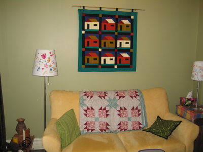 Houses and bear-paw quilts in our living room.
