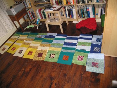 My second queen-size quilt, in pieces on the den floor.