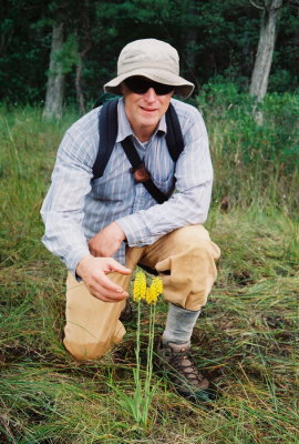 Eric Lamont with the tallest specimens of Gymnadeniopsis integra. NJ  8/16/09