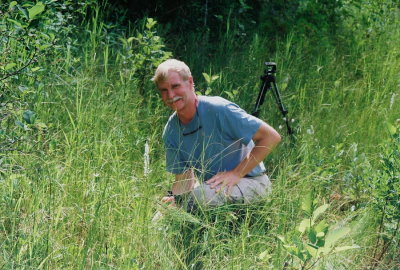 134a)  Steve Baker with Platanthera dilatata. Steve is very knowledgeable and guided us to  orchid sites near Cedarville, MI