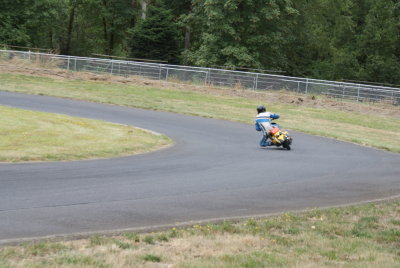 Scooter driver gettin' a knee down