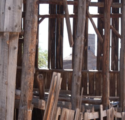 Grainery Seen Thru Barn Wall