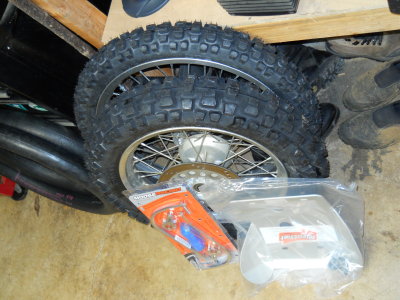 Now that it runs good, time to set it up for the riding I do with New Pirelli MT-21's bark busters and a bash plate