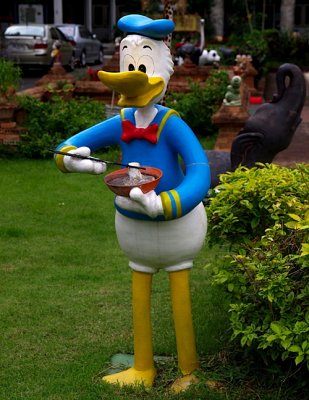 Donald Duck with a bowl of noodles