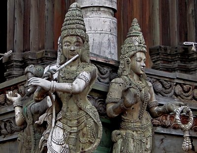 Lord Krishna with flute, goddess with malai