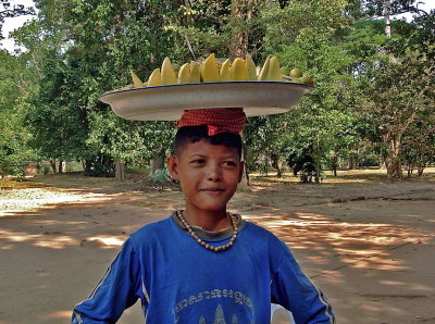 Boy with a tray on his head