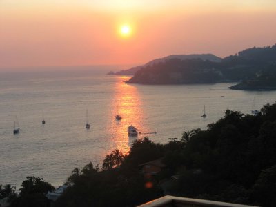 Sunset over Zihuatanejo Bay - view from condo balcony