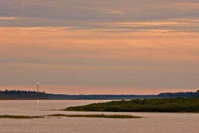 Hydro tower with strobe light at sunset