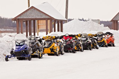 Snowmobiles parked across from the Polar Bear Lodge in Moosonee