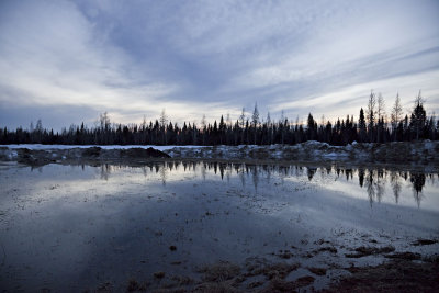 After sunset reflections in a snowmelt pond on the old air strip in Moosonee 2009 April 20