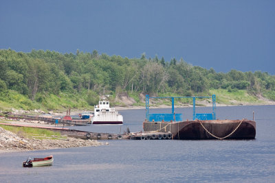 Barges and dark skies over James Bay