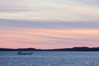 Barge Manitou II headed to Moose Factory at sunrise