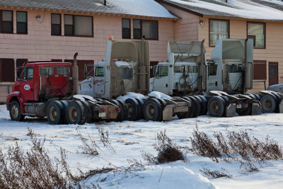 Trucks parked behind Moosonee Lodge