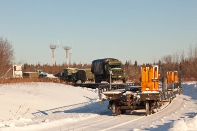 Army vehicles waiting on Ferguson Road lead