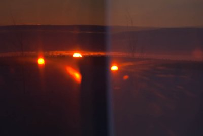 Sunrise reflected in kitchen window 2011 Feb 15