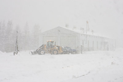 Shops at Moosonee ONR station during blizzard, view from station platform