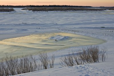 Clear ice at bottom of McCauley's Hill between shore and road to Moose Factory